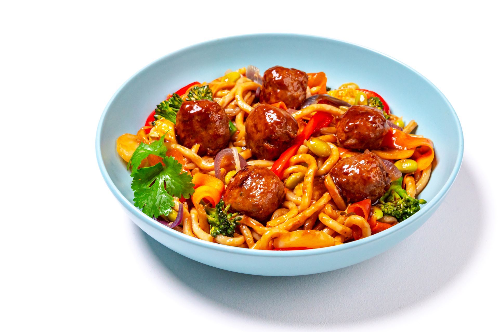 Hoisin meatballs with noodles in a blue bowl